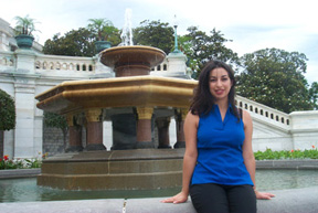 Clara Fields sitting next to a fountain