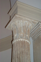 Similar to the picture on the left, this photo is a close-up view of the corn engravings at the top of each collumn.