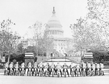 Members of the U.S. Capitol Police sitting on motorcycles in front of the Capitol.